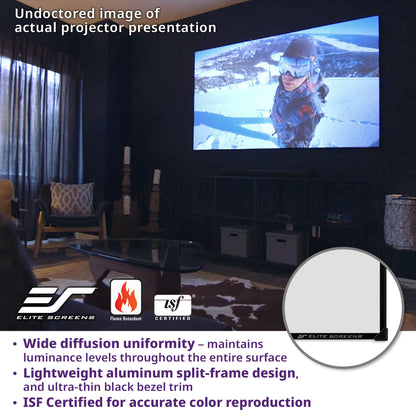 Living room with a projector screen displaying a person skiing, featuring Elite Screens branding and certification logos.