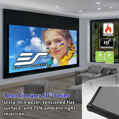 Living room with a large projection screen displaying a child's face, Elite Screens branding, and product features.