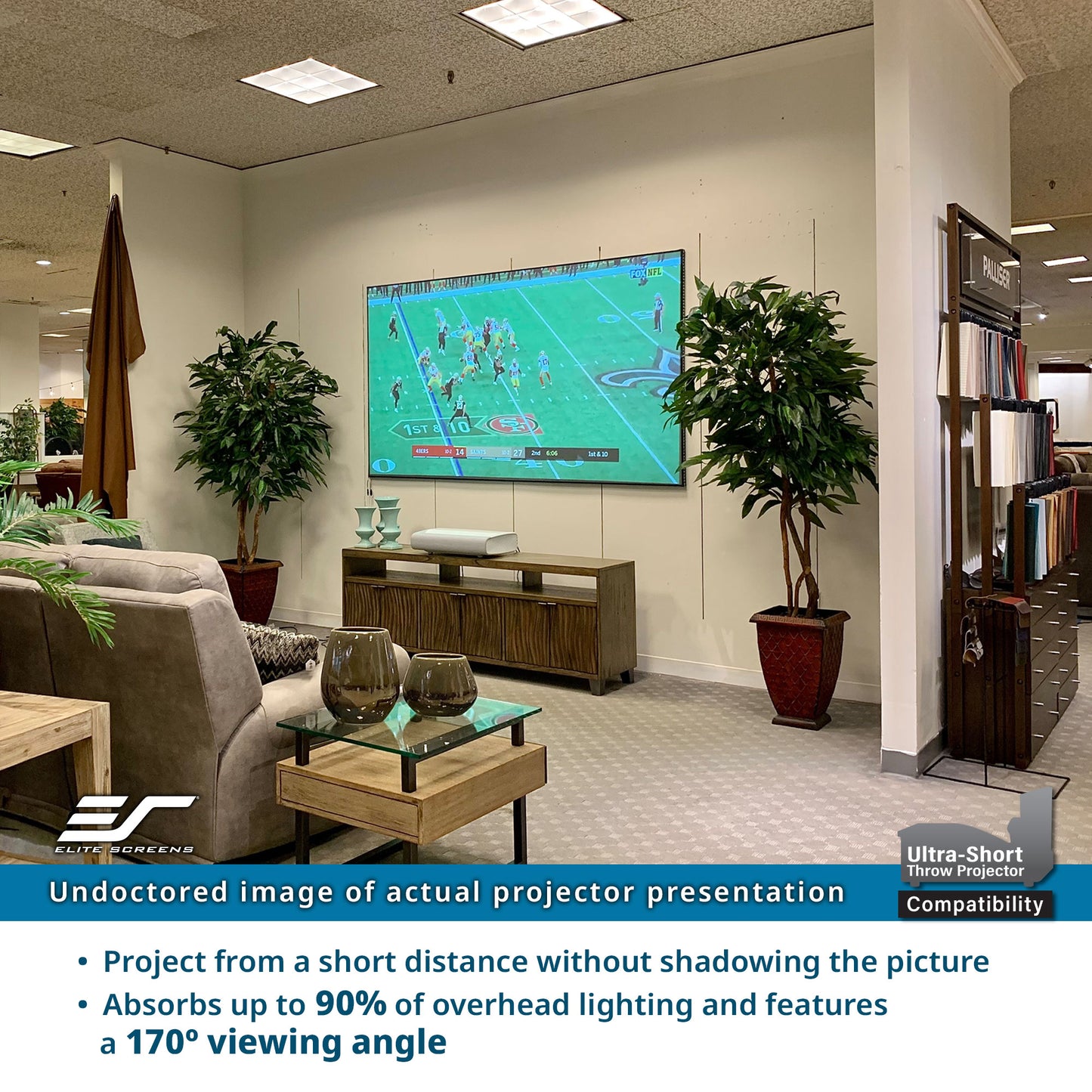 Living room with a large screen displaying a sports game, featuring a projector and its compatibility details.