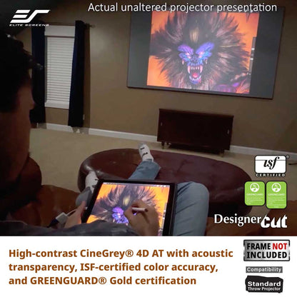 A person in a home theater setting uses a tablet to color-correct a large projector screen showing a monster print. The image includes branding and certification logos for Elite Screens, DesignerCut, ISF, and CineGrey.