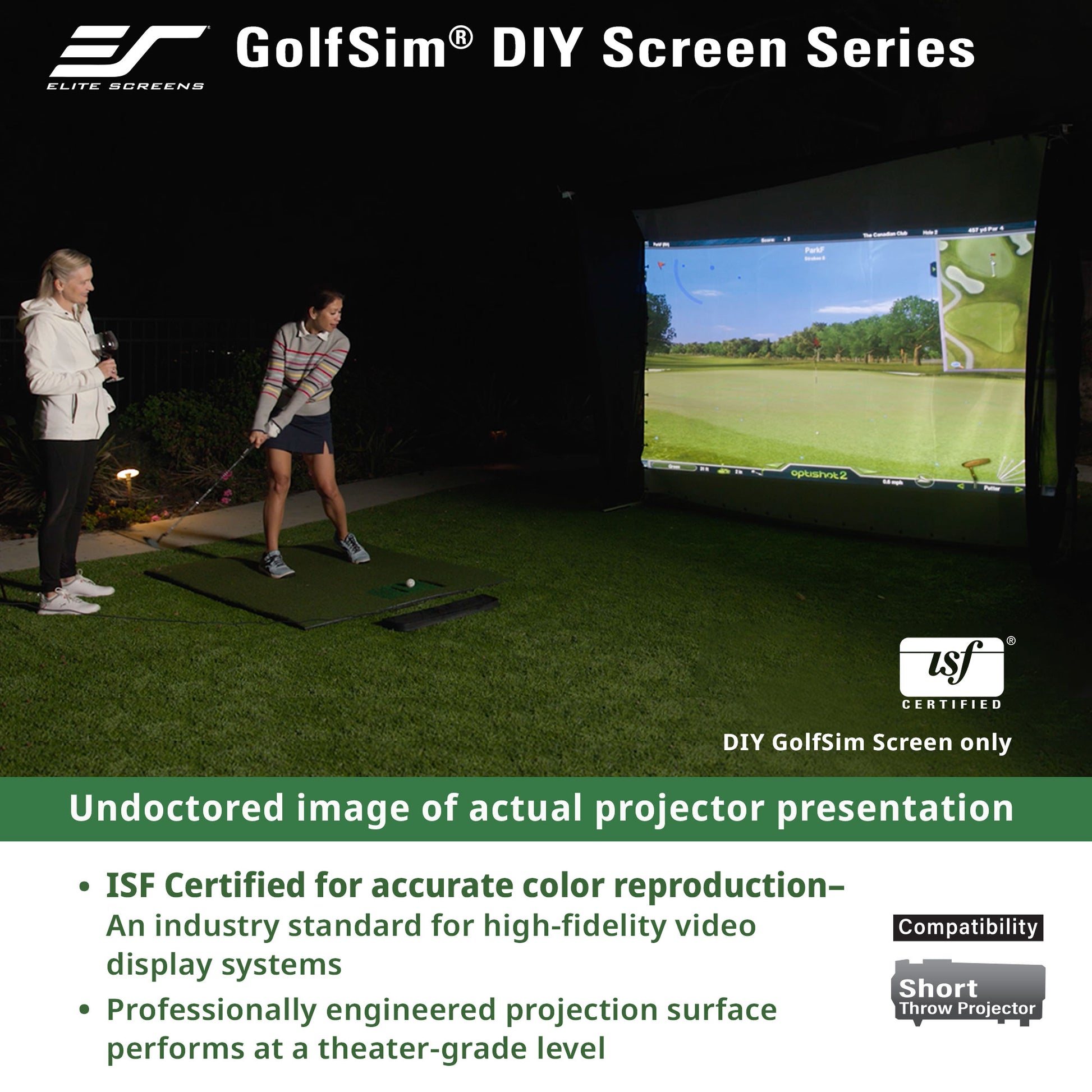 Two people using a GolfSim DIY screen system in a dark room with a projected golf course.