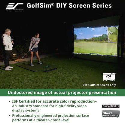 Two people using a GolfSim DIY screen system in a dark room with a projected golf course.