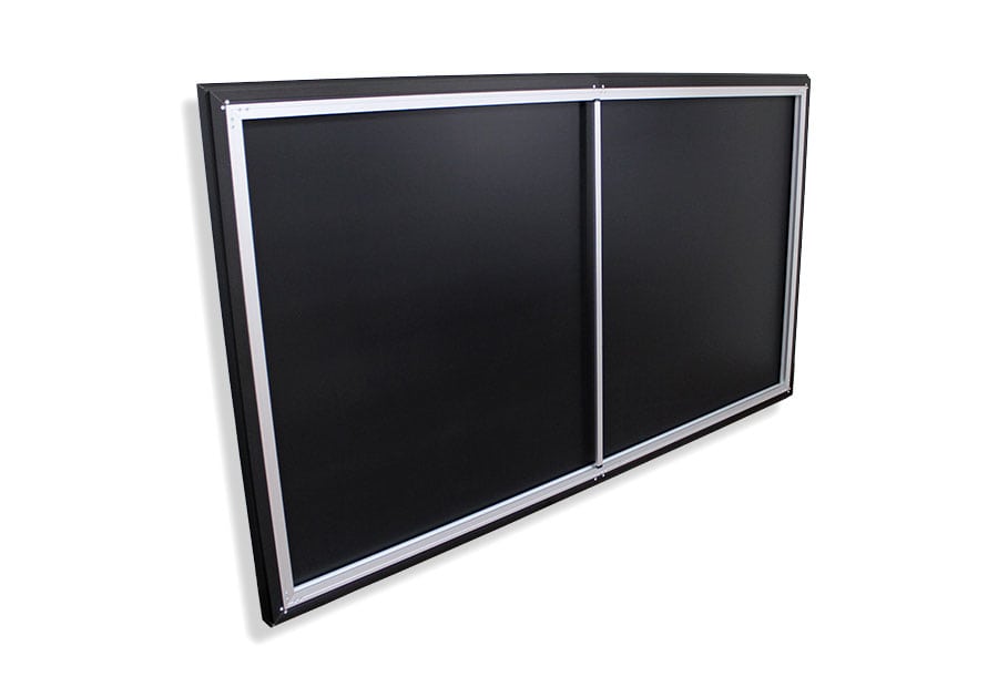 Double-sided black bulletin board with silver frame on a white background