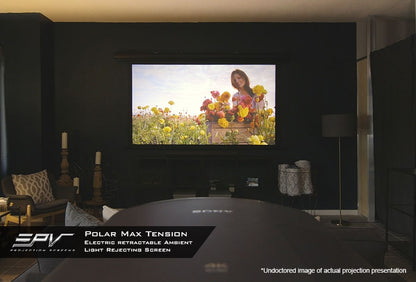A large ambient light reflecting screen mounted on a dark wall in a modern living room, displaying a colorful outdoor flower scene. The screen is labeled 'SPV Polar Max Tension' with promotional text at the bottom.