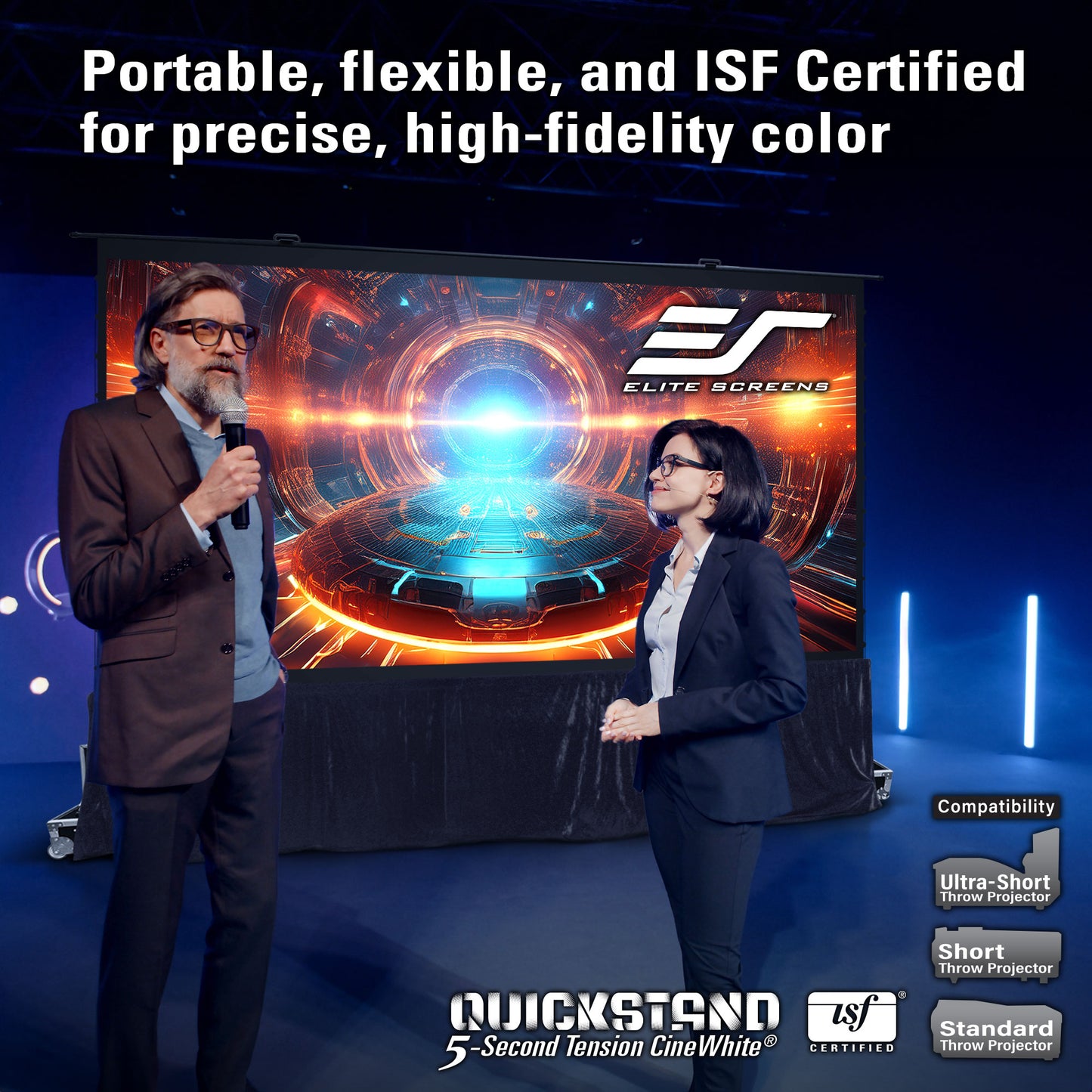 Two presenters standing in front of a large screen displaying Elite Screens branding, with text about product features.