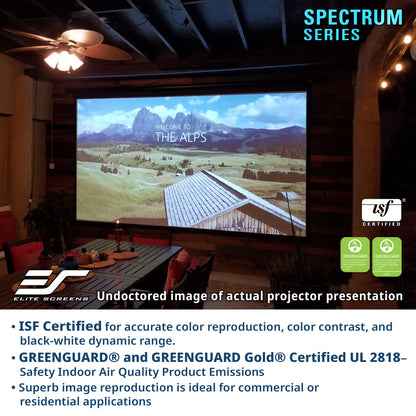 Projector screen displaying a scenic landscape with ISF and GreenGuard certification logos, in a home theater setting.