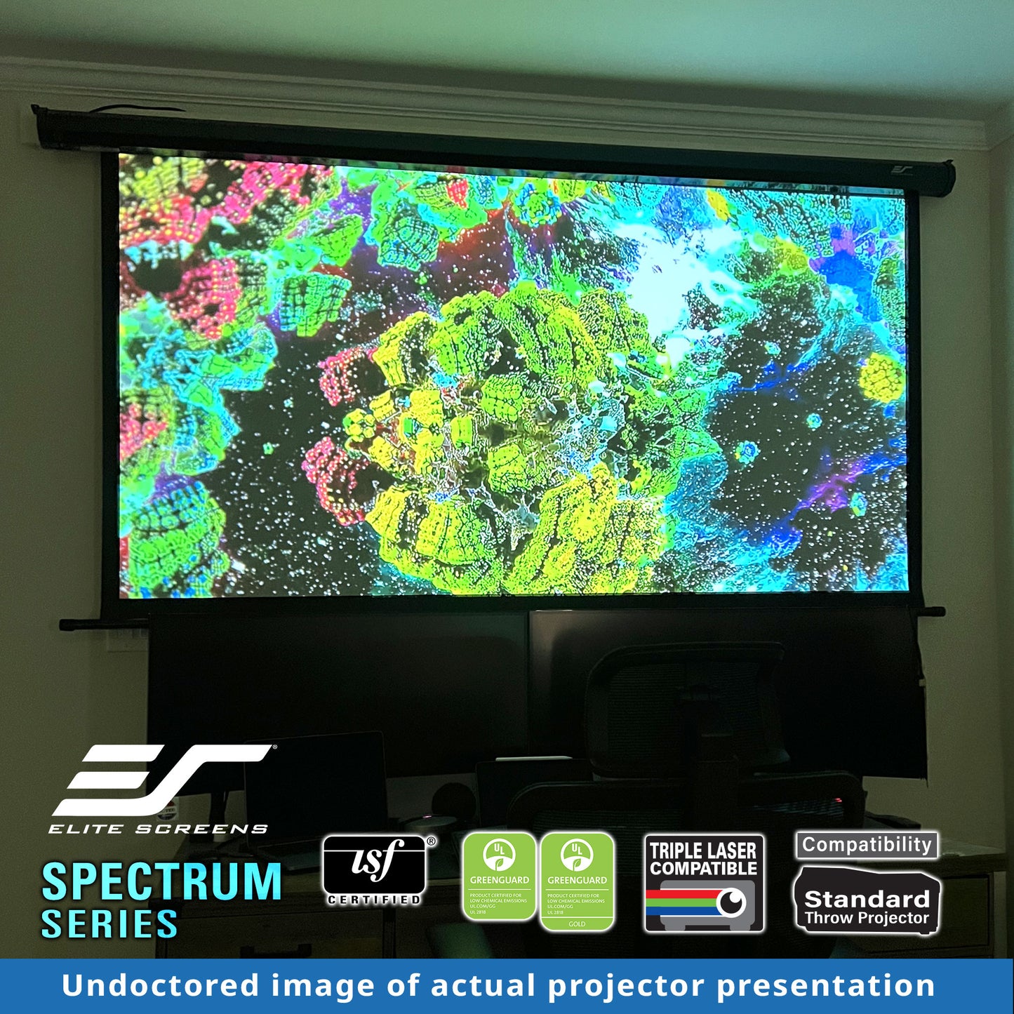 Projector screen displaying a colorful abstract pattern with Elite Screens branding.