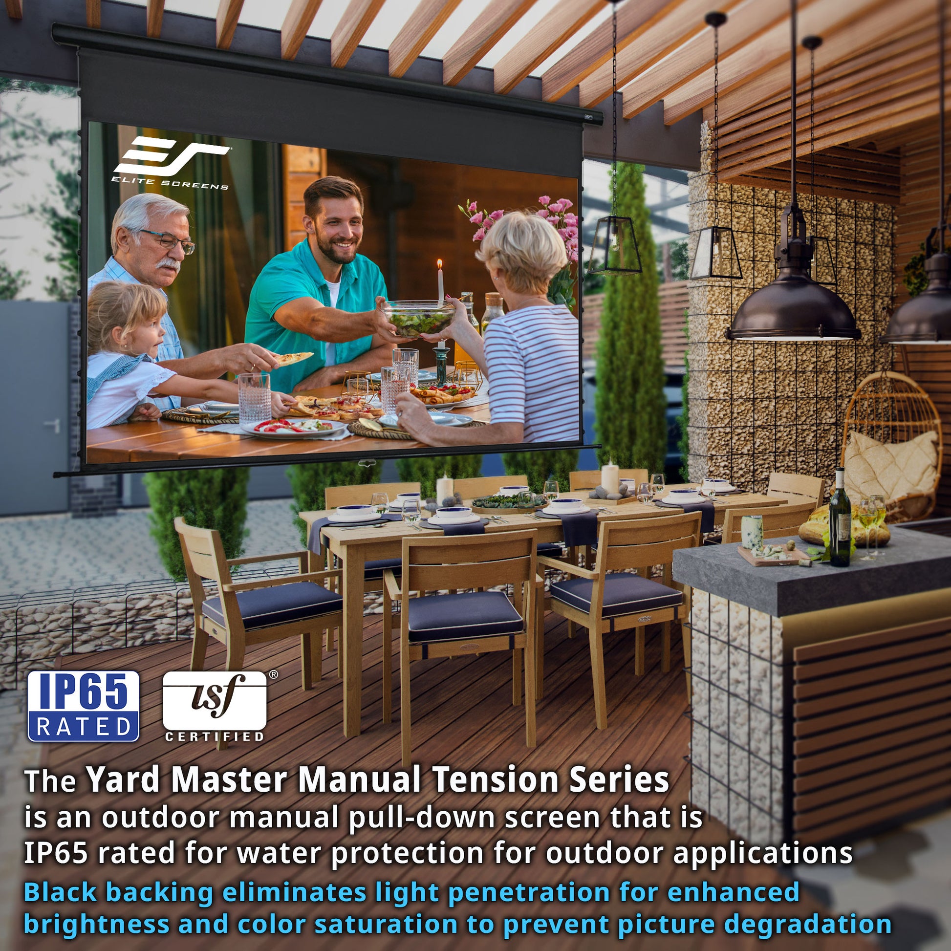 Outdoor dining area with a manual pull-down screen displaying a family meal, featuring ES Robbins branding.