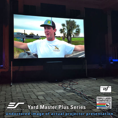 Large outdoor screen displaying a man in a field with 'Elite Screens Yard Master Plus Series' branding.