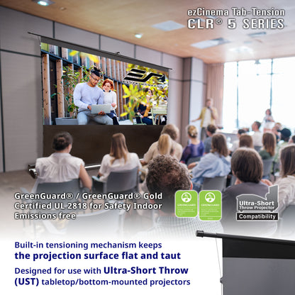 ezCinema Tab Tension CLR 5 Series screen in a classroom setting with people watching a presentation.