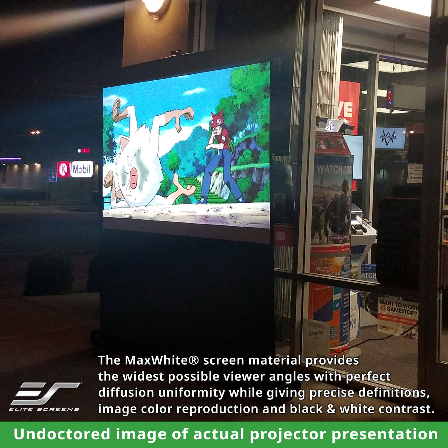 Projector screen displaying an animated scene with a MaxWhite screen material advertisement.