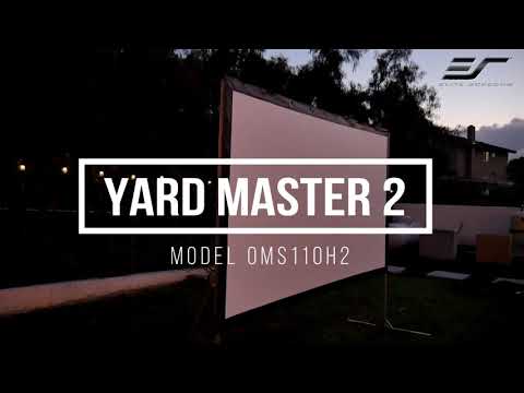 Outdoor projection screen in a backyard setting